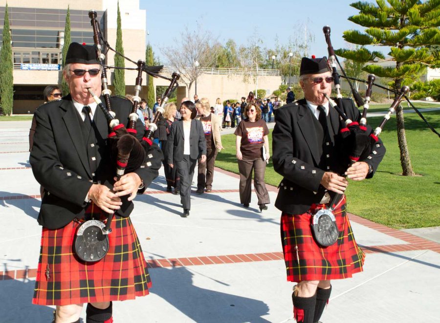 Bagpipers Bill Boetticher and Wally Boggess lead the opening parade at the 22nd annual event. This year will be the 24th annual Multicultural Day.