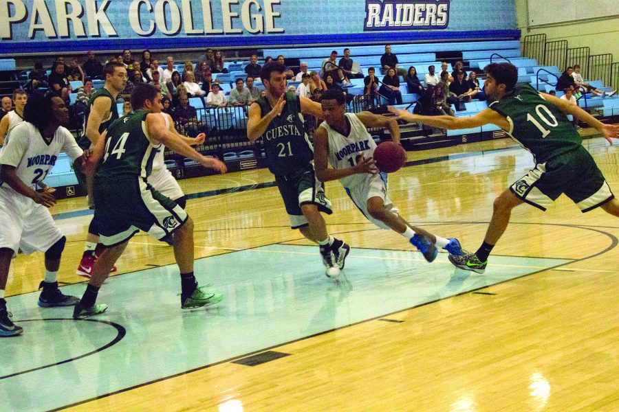 Moore drives to the rim in the victory against Cuesta College.