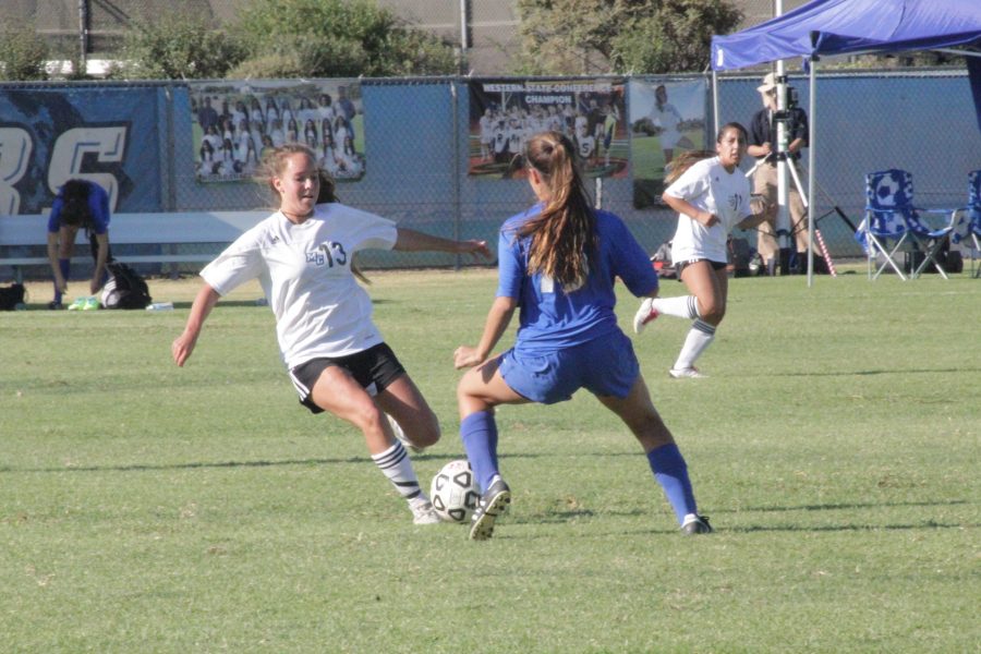 Mid-fielder, 19-year-old Marissa Horton (13), playing hard during the second half against Eagles defense. Lady Raiders lost to The Eagles 0-3. Photo credit: Victoria Espinosa.