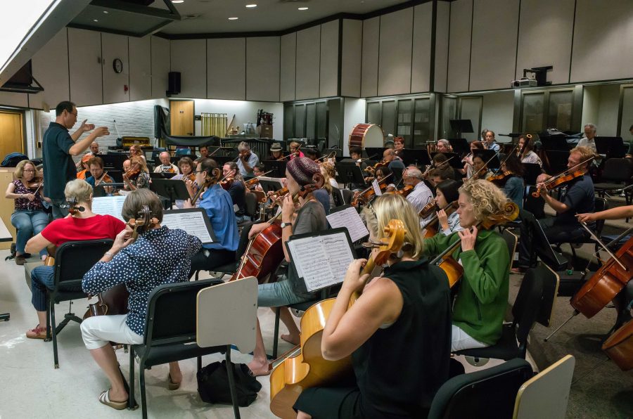 Moorpark's music director James Song conducts the Moorpark College Symphony Orchestra during practice on Sept. 5. 