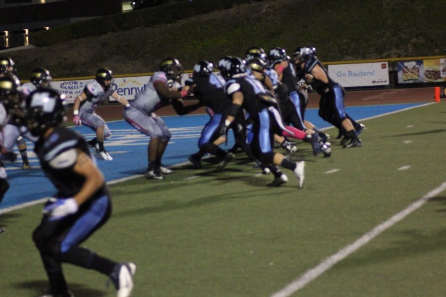 Raiders+Defense+defence+attacks+Pasadena+on+the+Goal+Line.+Moorpark+won+23-17+in+overtime+against+Pasadena+Photo+credit%3A+Chase+Oliver