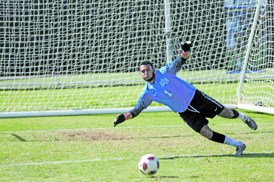 Moorpark Goalie Luis Monroy hones his skills at practice to prepare for the games. Monroy has 55 saves on the season Photo credit: Chase Oliver
