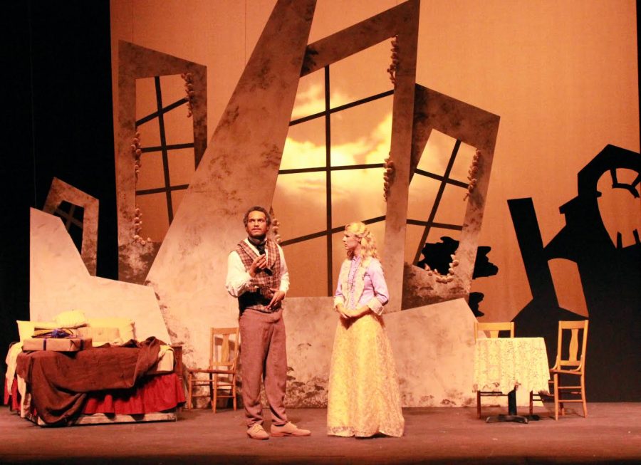 Jeremiah Gray as Van Helsing (left) and Leah Dalrymple as Lucy (right) delve deeply into their characters on stage during a dress rehearsal performance of "Dracula." Photo credit: Samantha Wulff