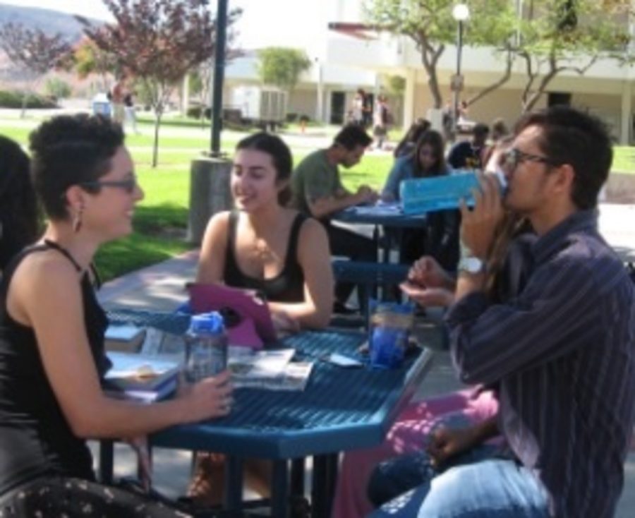 Students discuss the potential danger of reusable water bottle. Photo credit: Annette Leeds