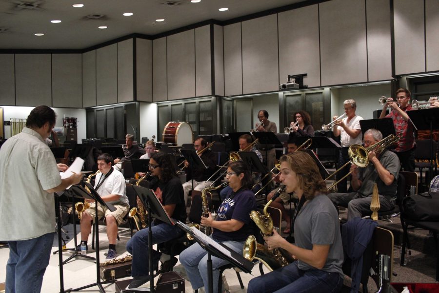 Brendan McMullin, director of jazz program, conducts his class during rehearsal on Nov. 12 for the upcoming show. 