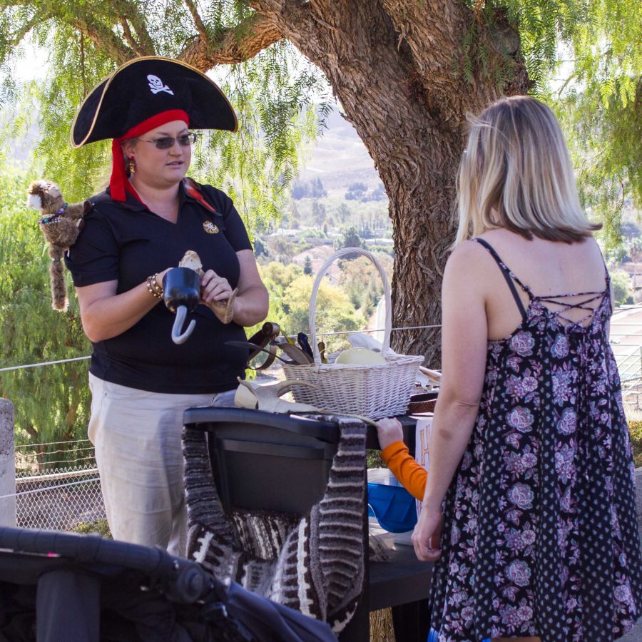 First year student for EATM Kerstin Sweeney as a pirate interacting with one of the guests at Boo at the Zoo Photo credit: Shaina Stitch