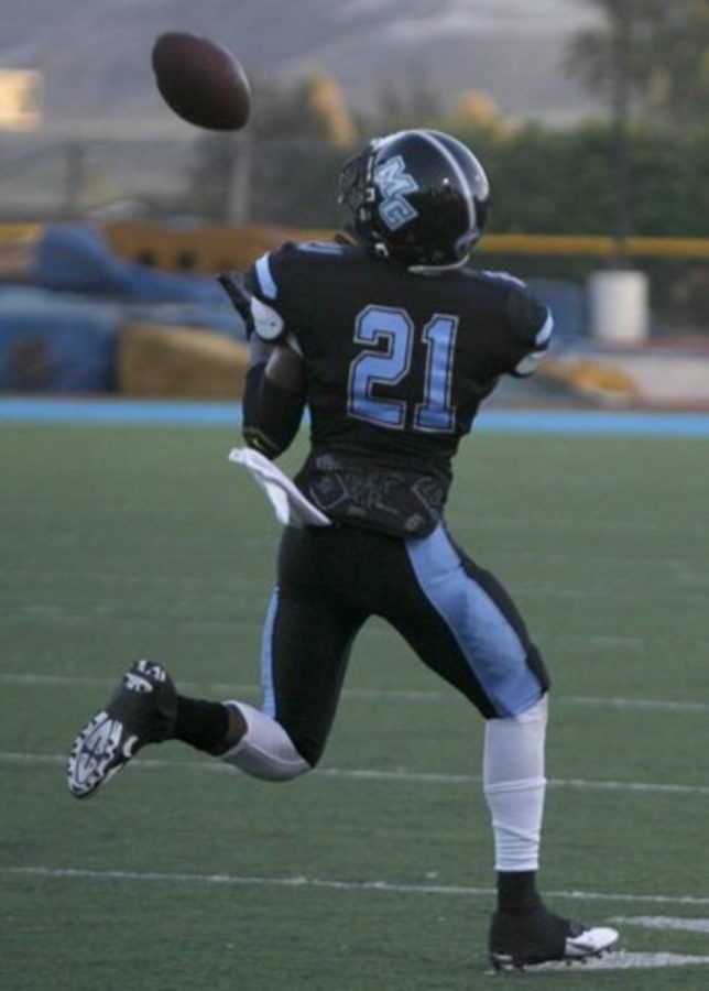 Wide Receiver Jalen Burrel catches the ball at home against Orange Coast.