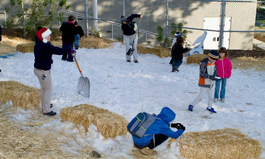 Children play in the snow at the at a previous years event.