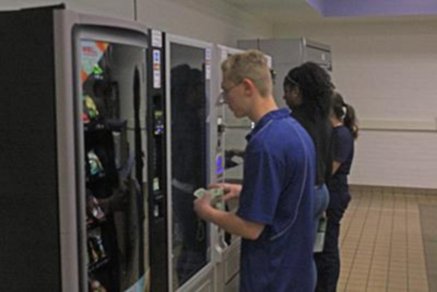 Rachel McHenry, who submitted the letter, believes Moorpark College should have healthier food choices.Eighteen-year-old Joshua Janik, home schooled student and freshmen at Moorpark college, seen in the picture, decides what he wants out of the vending machine. Photo credit: Brian Varela