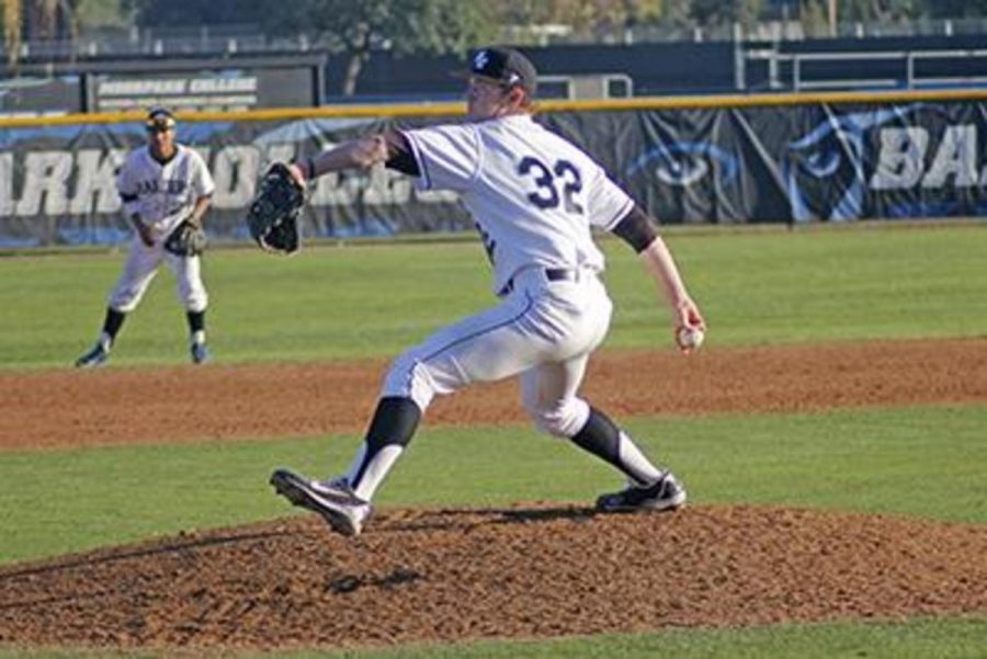 Freshman pitcher Jake Eaton throws a pitch against East L.A. College batter during the top of the seventh inning. The Raiders went onto win 12-10 Photo credit: Chase Oliver