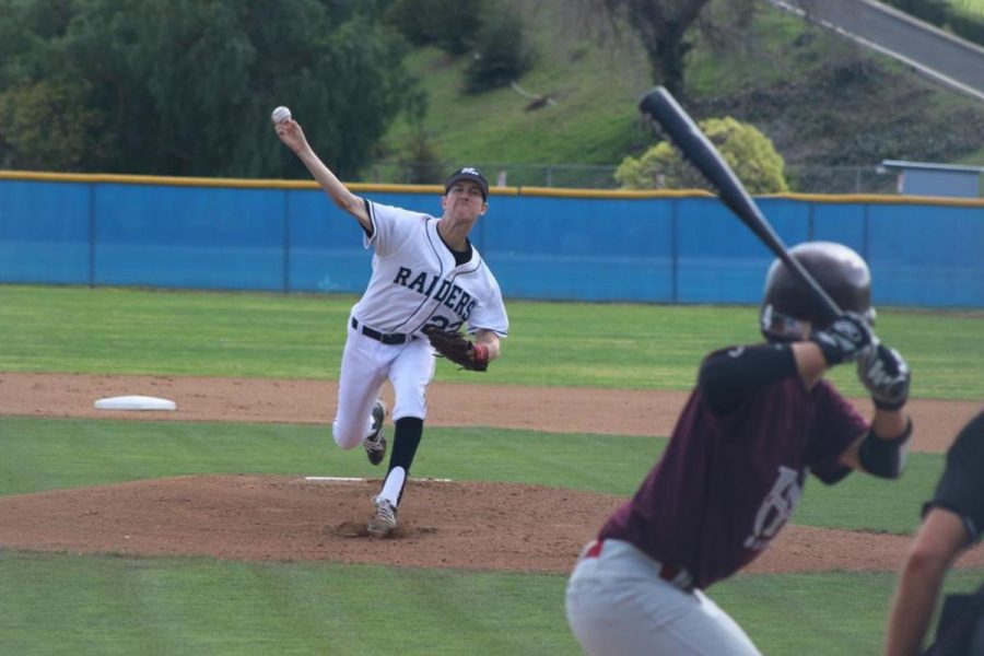 Wyatt+Birg+pitched+a+shutout+against+Antelope+Valley+on+opening+day+at+Raiders+Stadium.+Moorpark+won+the+game+3-0+in+their+first+game+back+after+a+two+year+hiatus.+Photo+credit+to+Darrell+Fitzpatrick