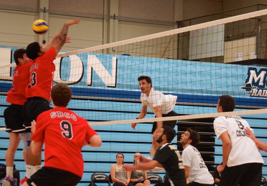 Michael+Esper%2C+outside+hitter%2C+delivers+an+explosive+spike+to+rally+the+Raiders.+Photo+credit%3A+Tyler+Irvin