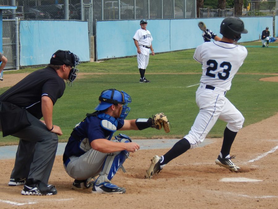 Outfielder Robbie Hynes swings and misses in the sixth inning against Allan Hancock College. The Raiders won the game 7-2. Photo credit: Brian King