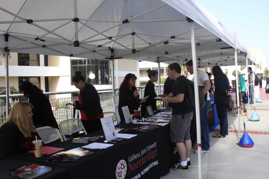 Students speak with representatives from CSUN during last years CSUN and CSUCI Day on March 19, 2015. Photo credit: Nikolas Samuels