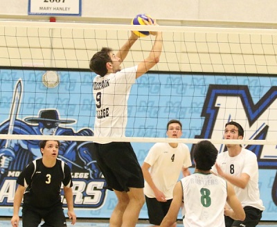Nicholas Shoemate, setter/outside hitter, adds to his assists, to set the ball for 	middle blocker 	Mario Urquidez . Photo credit to Moorpark College Athletics.