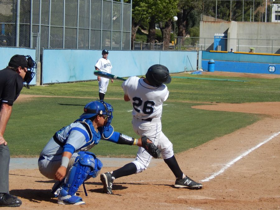 Jack Mulvilles base hit helps tie the game, 3-3, in the seventh inning against Oxnard. The Raiders won, 4-3, in the 12th inning. Photo credit: Brian King