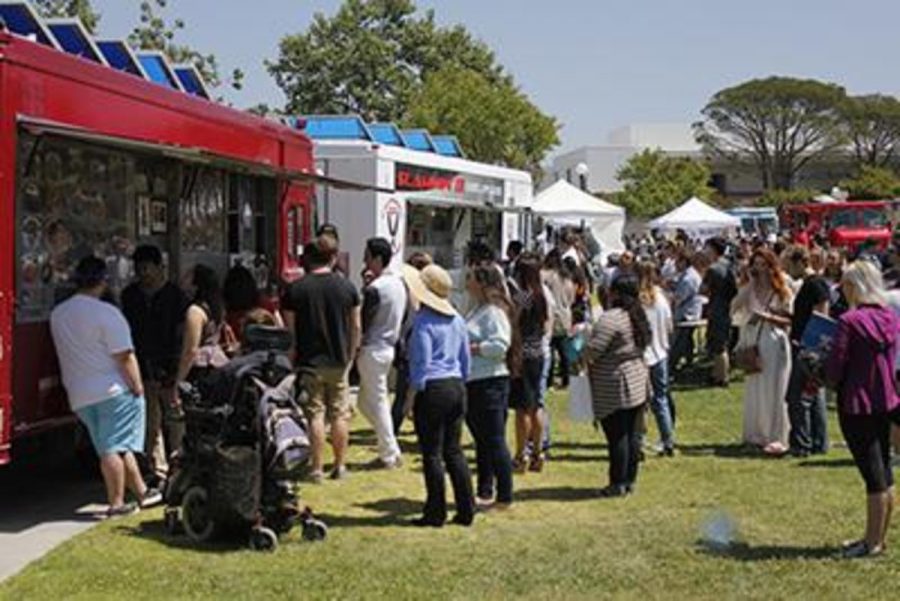 Food trucks could be used to bring hot meals back to Moorpark College. Above, students flock to the trucks during Multicultural Day in April. 