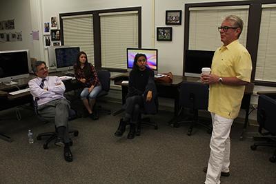 Bernardo Perez talks to Moorpark College President, Dr. Luis P. Sanchez and Student Voice students, (left to right) Hope Leonard and Amanda Galvez, about his job as a member of the Board of Trustees. Photo credit: Chase Oliver