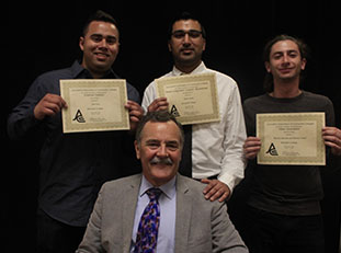 Moorpark Colleges Student Voice staff display the awards they won at a statewide journalism conference April 9-11. Above Adviser Michael Hoffman, center, with Student Voice award winners, from left, Alan Ruiz, Brian Varela and Nikolas Samuels