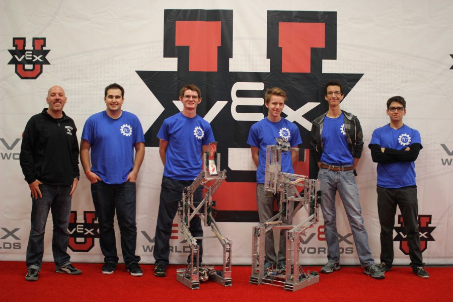 Five members from the Moorpark College Engineering Club as well as student advisor Donny Munshower, left, stand with their robots. The Moorpark College engineering club got 20th out of 54 teams from April 15-18 in the Vex U World Championship in Kentucky.