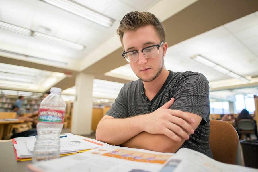Brent Nernberg, who plans on becoming either a firefighter or paramedic, studies for his Biology exam.