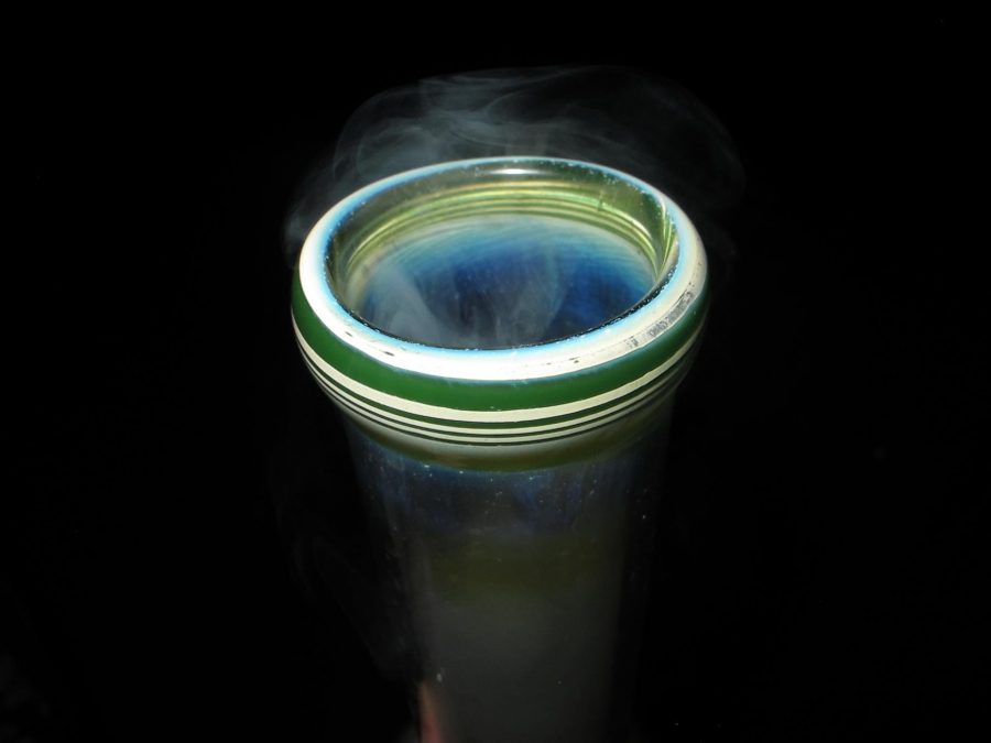 Smoke rolls off the top of a bong; a common smoker's paraphernalia. Photo credit: Molly-Anne Dameron