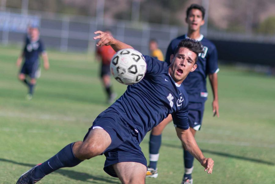 Orencio+Robles+attempts+a+finish+at+goal+in+the+last+few+minutes+of+the+game+against+Cypress+College.+Photo+credit%3A+James+Schaap