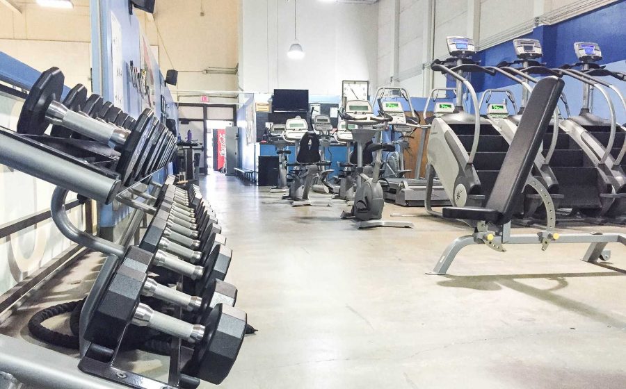 The Fitness Lab offers students the use of multiple pieces of equipment, including stair-masters, stationary bikes and free-weights. Photo credit: Courtney Resnick