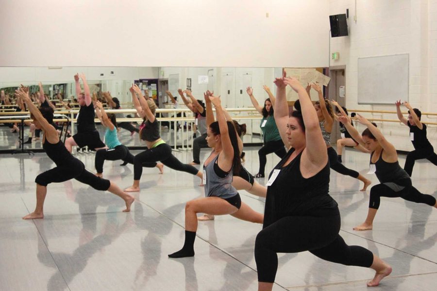 Dancers warm up during auditions in the Performing Arts Center. Photo credit: Janett Perez