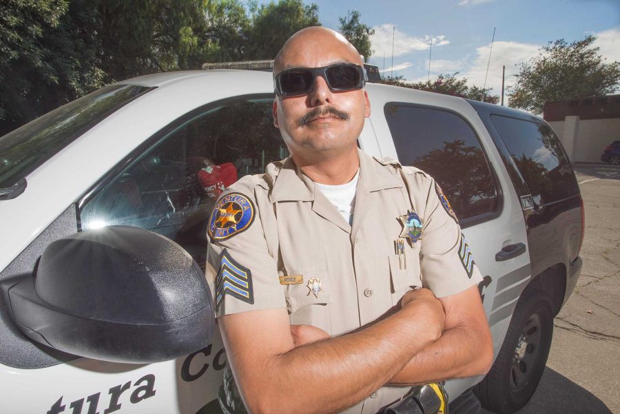 Sgt. Juan Ponce poses in front of his vehicle in Moorpark. Photo credit: James Schaap