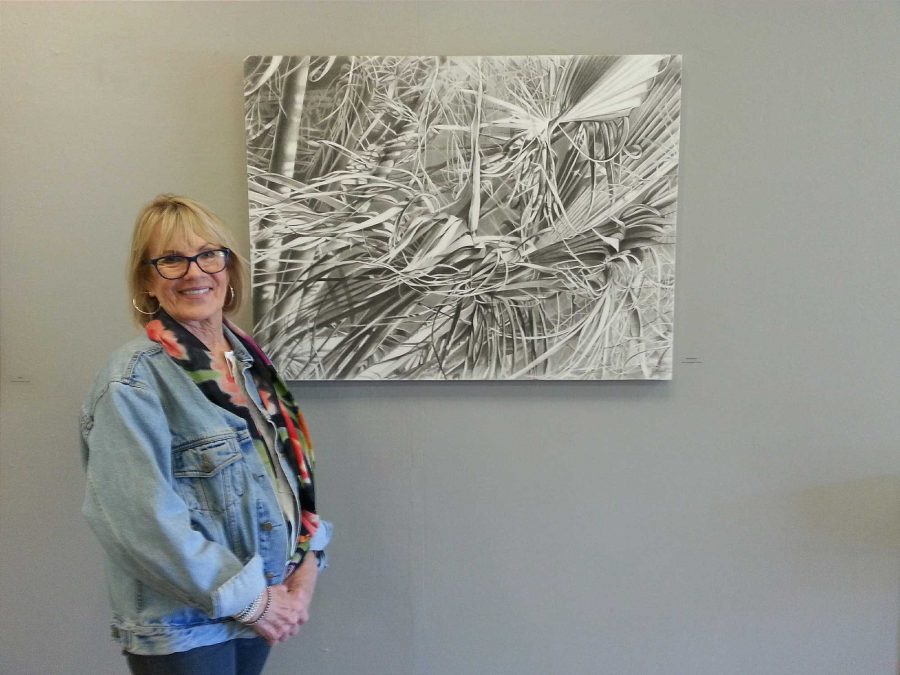 Artist Catherine Ruane displaying her work at the Moorpark Art Gallery. Photo credit: Janett Perez