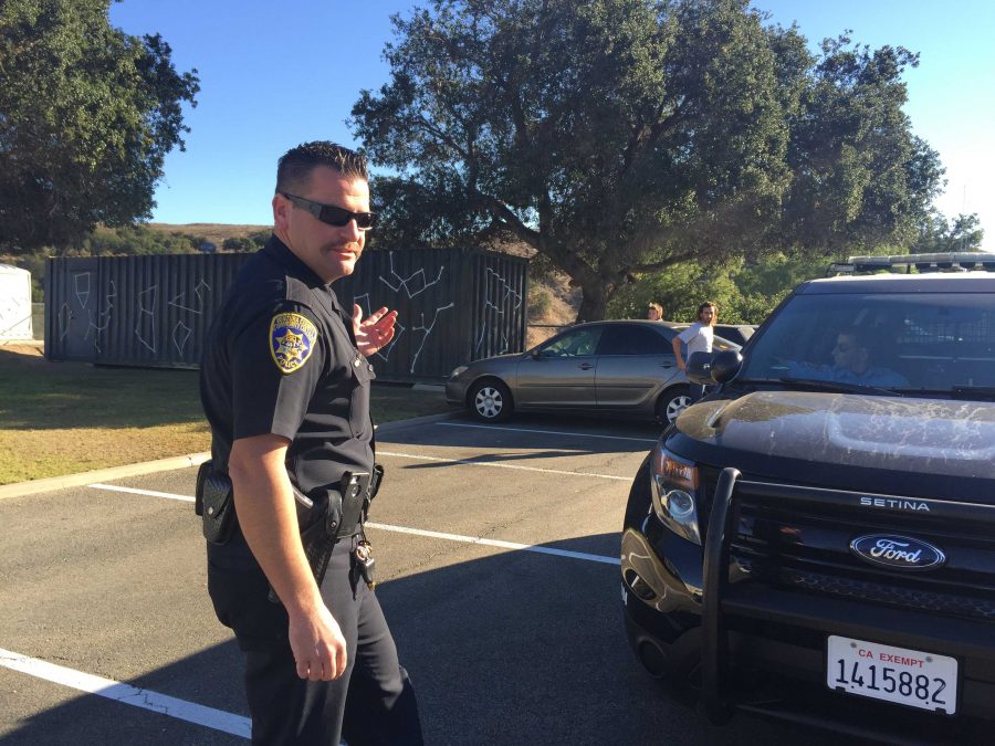 Officer Andrew Huisenga, along with a Cadet Jake Kerstein, patrol the observatory parking lot (D and E) to look for suspicious activity. Photo credit: Renee Abrahan