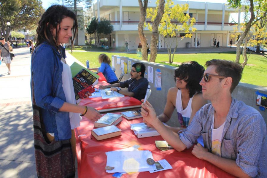 The History Club gives out information to prospective members at last years Club Rush. Photo credit: Nikolas Samuels