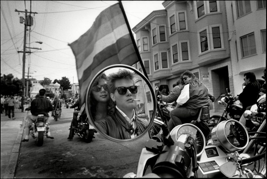 People revving up their motorcycles while getting ready to start the gay pride parade in 1988. Photo credit: Saul Bromberger