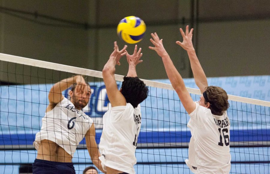 Laser Jake Heinrichs (6) of Irvine Valley College sends the ball over Raiders Owen Yoshimoto (11) and Zach Erickson (16) during Friday night’s Men’s Volleyball game in the Raider Pavilion. Irvine Valley stole the victory in the end after an incredibly close fifth set. Photo credit: Willem Schep