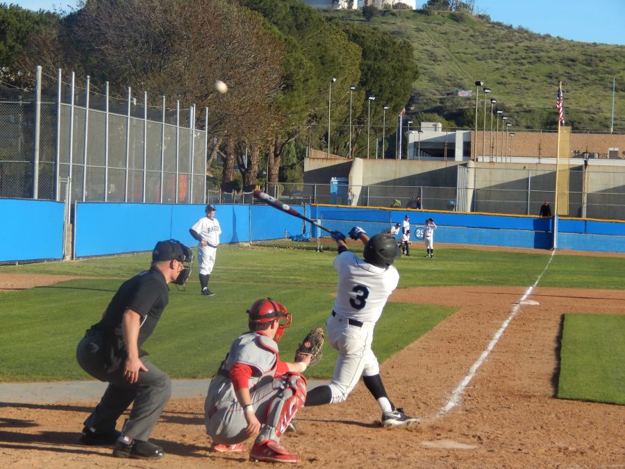 Second baseman Garrett Kueber fouls off a pitch in the opening home game of the season against Bakersfield College on Thursday. He doubled and scored the first run of the game in the third. Photo credit: Brian King