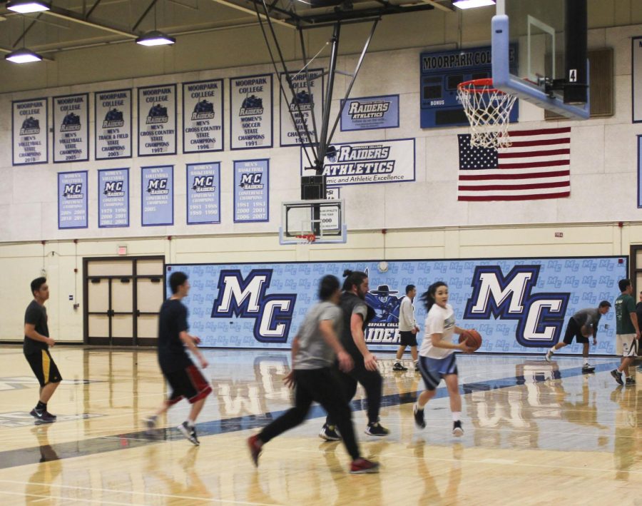 Students staying active in their M82 Basketball class. Photo credit: Sheila Samson