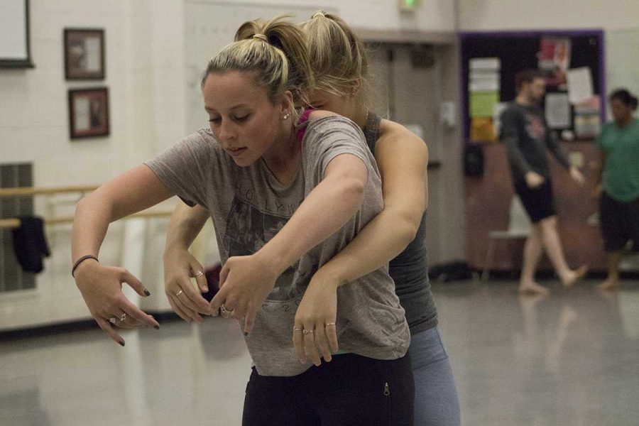 Allie Lieberman (front) and Savanna Payton (back) in Performing Dance Ensemble practicing for one of the pieces to be featured in Motion Flux. Photo credit: Christine Rasmussen