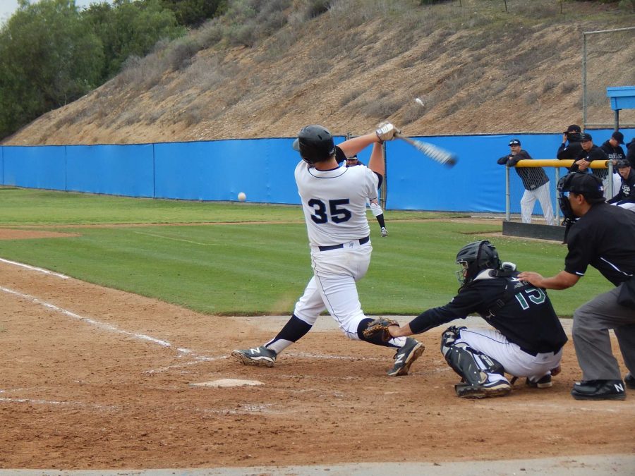 Moorpark first baseman Dalton Duarte hits a foul in the seventh inning against Cuesta College at Raiders Stadium on Saturday.