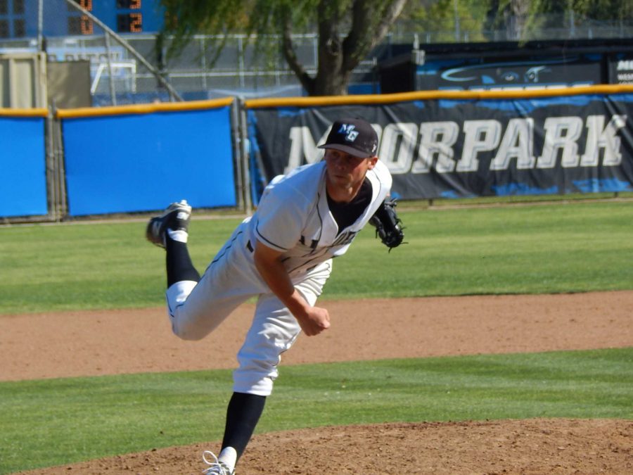 Raiders+reliever+Zak+Daniels+throws+to+the+plate+against+the+Bulldogs%2C+Thursday.+He+got+the+win+11-7+in+three+and+two+thirds+innings+of+work.+Photo+credit%3A+Brian+King