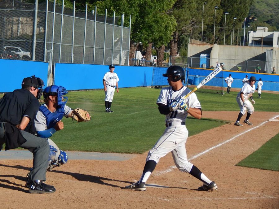 Catcher Riley Conlan avoids an inside pitch with the bases loaded in the eighth inning against the Bulldogs. He walked, forcing in the run from third.