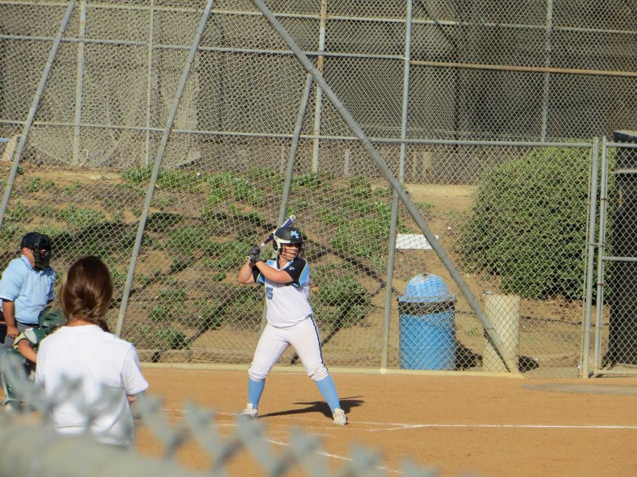 Freshman pitcher Caitlyn Vinyard of Moorpark awaits the pitch from LA Valley College. Photo credit: Nick Gurrola