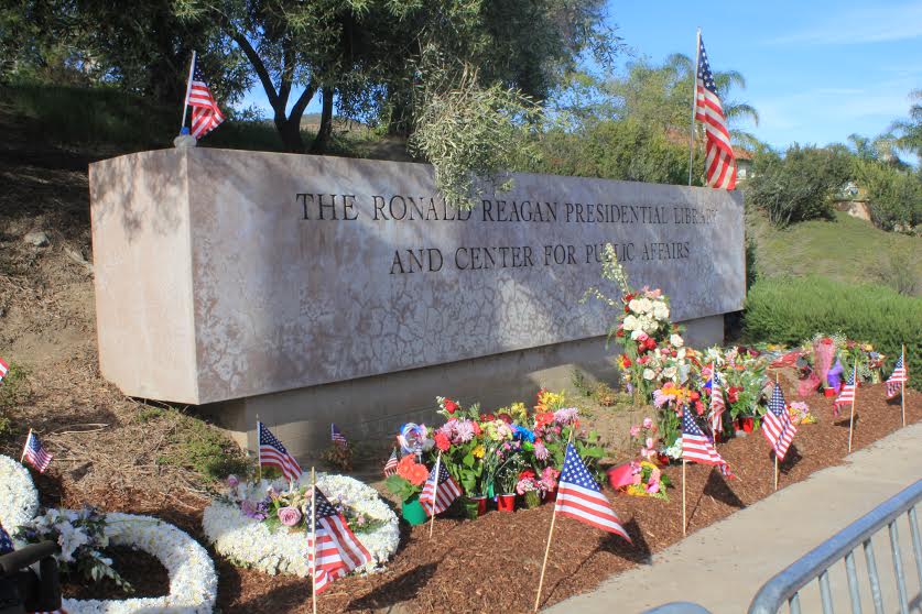 Many of the public leaves flowers outside the Ronald Reagan Library in memorial of the former First Lady Nancy Reagan on Thursday, March 10. Photo credit: America Castillo