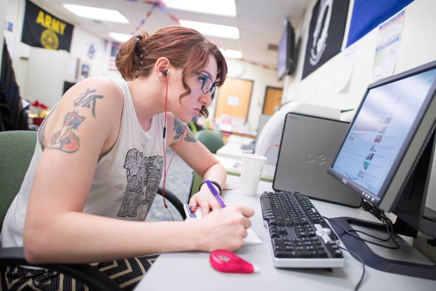 Nicole Nelson, 27, neuroscience/biomedical engineering major and a veteran, studies in the Veterans Resource Center on Feb. 26, 2016. Photo credit: James Schaap