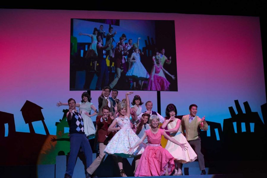 Part of the cast on stage inside the Performing Arts Center on the first night of dress rehearsals for the musical “Hairspray. Photo credit: Miles Shapiro