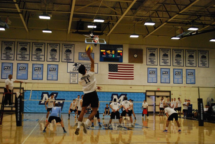 Owen Yoshimoto, 11, serving against Santa Monica. Photo credit: Spencer White