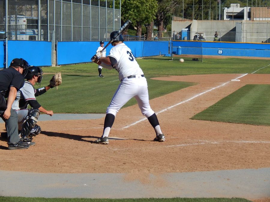 Raiders first baseman Dalton Duarte gets set to swing at the ball against Santa Barbara College on Thursday. The Vaqueros won the game 5-3.