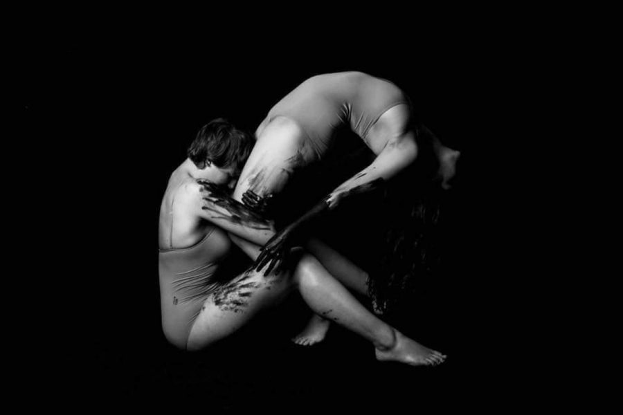 The main photo of INK entitled Broken depicting one woman on the verge of breaking and the other holding on and not allowing her to break. Photo credit: Stephanie Rodriguez