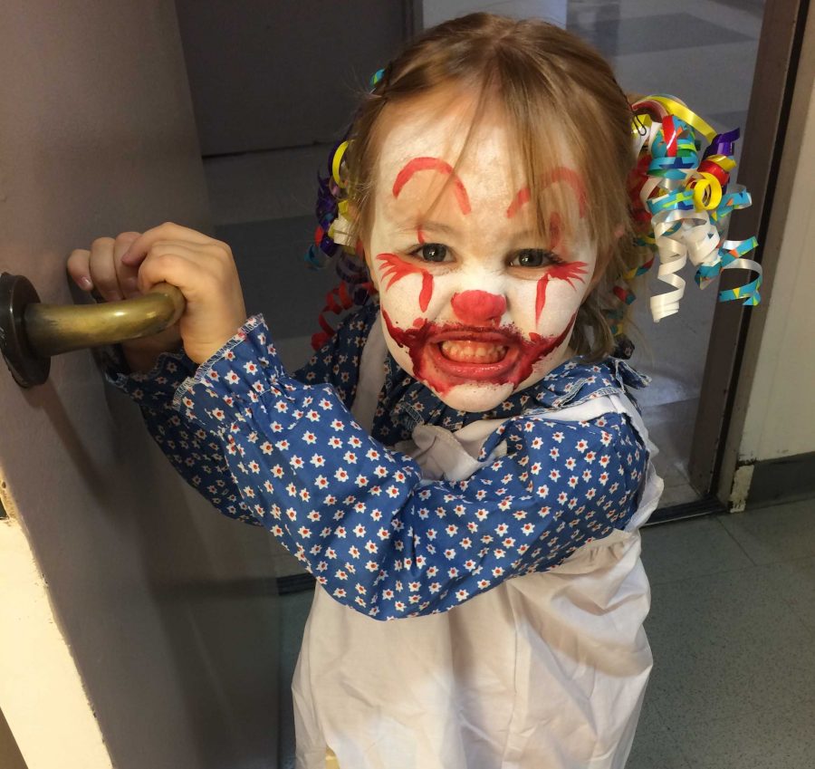 Aaliyah, 3, poses with her completed clown makeup. Photo credit: Jessica Frantzides