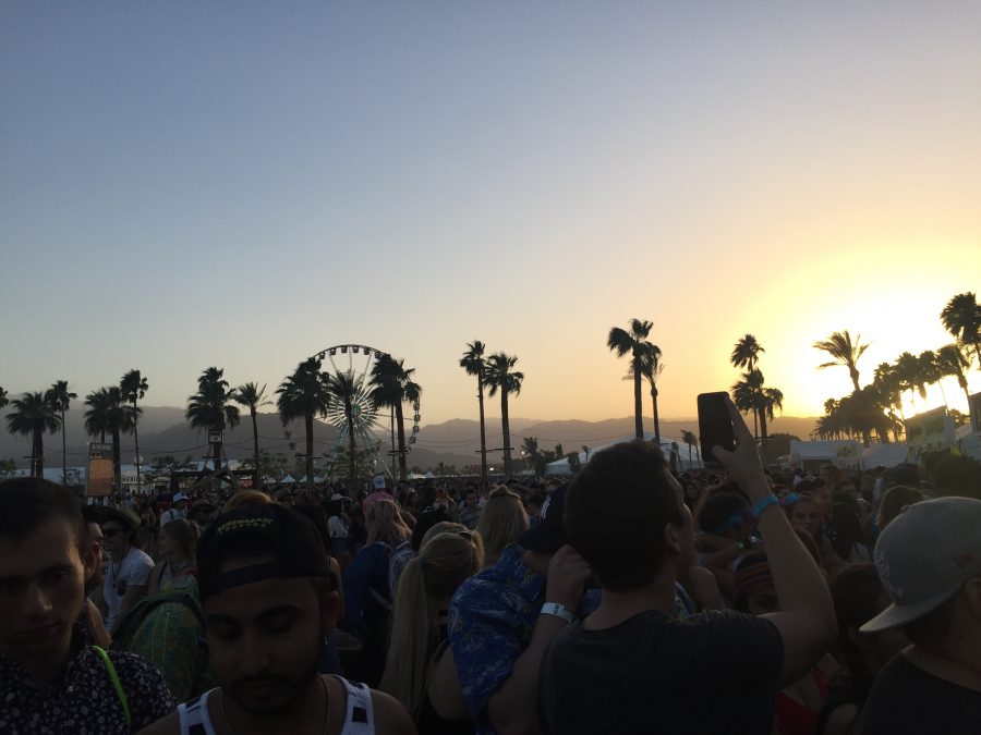 The vast crowd of people at this years Coachella enjoying the festival and all it has to offer, including scenic skies and great music. Photo credit: Kylie McCue